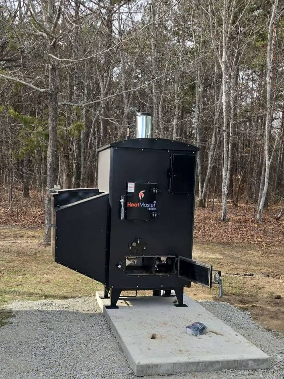 A HeatMaster P4000 set on a concrete pad with gravel around it